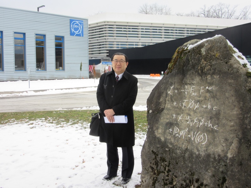 Vice-governor Chiba by the Standard Model Stone outside the CERN Control Centre