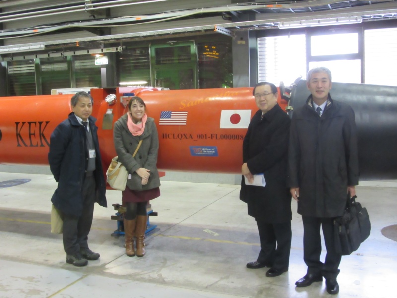 A cryomodule made through a partnership of the USA and Japan. From left to right: Prof. Akira Yamamoto (KEK), Amanda Wayama, Vice-governor Shigeki Chiba, Director Jun Sasaki of Iwate’s ILC Promotion Office