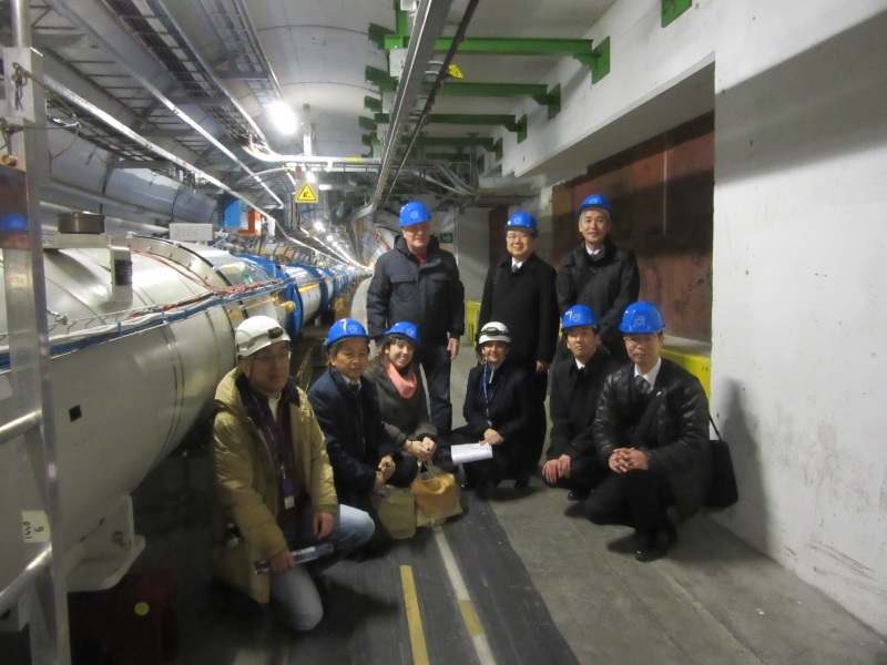 Right by the real thing – the Large Hadron Collider. From left to right: Prof. Osamu Sasaki (KEK), Prof. Akira Yamamoto (KEK), Amanda Wayama, LCC Director Lyn Evans, EN-ACE-OSS Section Leader Marzia Bernardini, Vice-governor Chiba, Director Jun Sasaki of Iwate’s ILC Promotion Office, Akihiro Kikuchi, Toshiyuki Sato